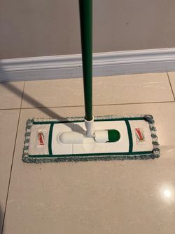 Wet and dry mop stick and used cloth , $15