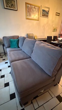 Three-piece grey sofa