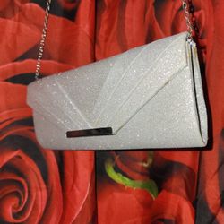 Silver evening bag carried shoulder

