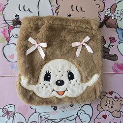 Monchichi with pink bows pouch
