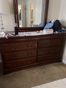 Dark Wood 8-Drawer Dresser with Mirror