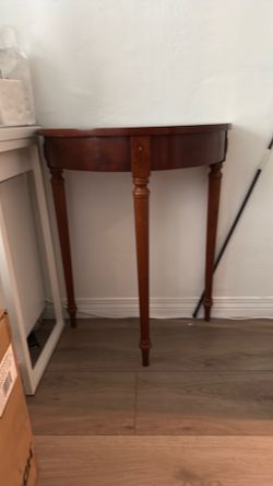 Dark wood half table