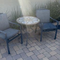 Outdoor Chairs And Mosaic Table