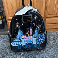 Disney Loungefly Disneyland  Mini Backpack Castle Matterhorn.  Brand new with tags.  Smoke free home 