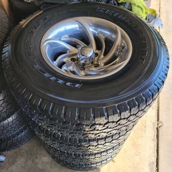 CHEVY OBS RIMS AND TIRES EAGLE ALLOYS  31×10.5R15 BRIDGESTONE DUELER H/T 5 LUGS 15X8
