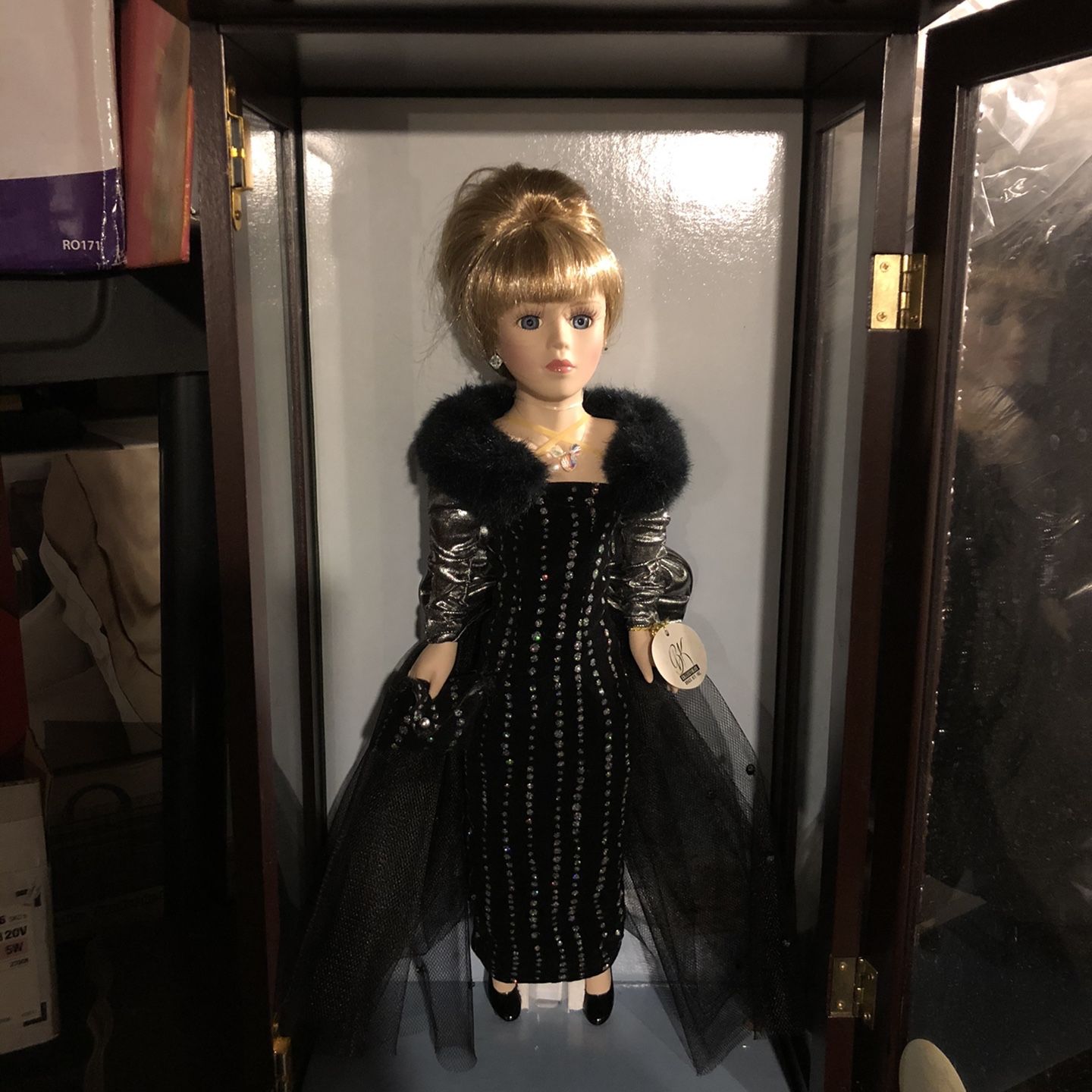 Camellia gardens 16 inch porcelain doll featuring sure Swarovski Crystal components