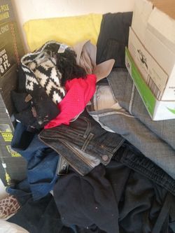 Bags of mens and women's clothing