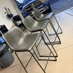 3 Brown leather bar stools