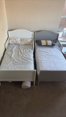Two toddler beds with mattress