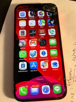 IPhone 13 cracked screen and back but works. Unlocked