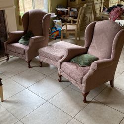 2 Chairs, One Ottoman, And A Coffee Table 