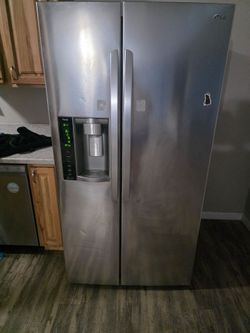 SUPER DEAL!!!!    Large French Door LG Fridge