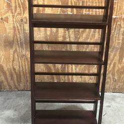 Casual Home 4-Shelf Folding Stackable Bookcase used in good condition.sturdy location below  31705 Wesley Chapel blvd Fl 33543 Storage Mart  