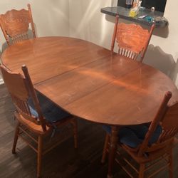 Nice Wooden Dining Table . You can Even Pull A Section Out To Make It Smaller If Need Be.