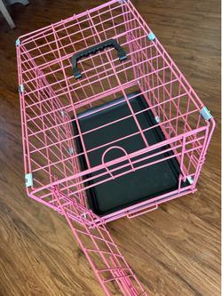 Small pink dog kennel