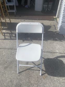 White folding chairs s,a,l, e