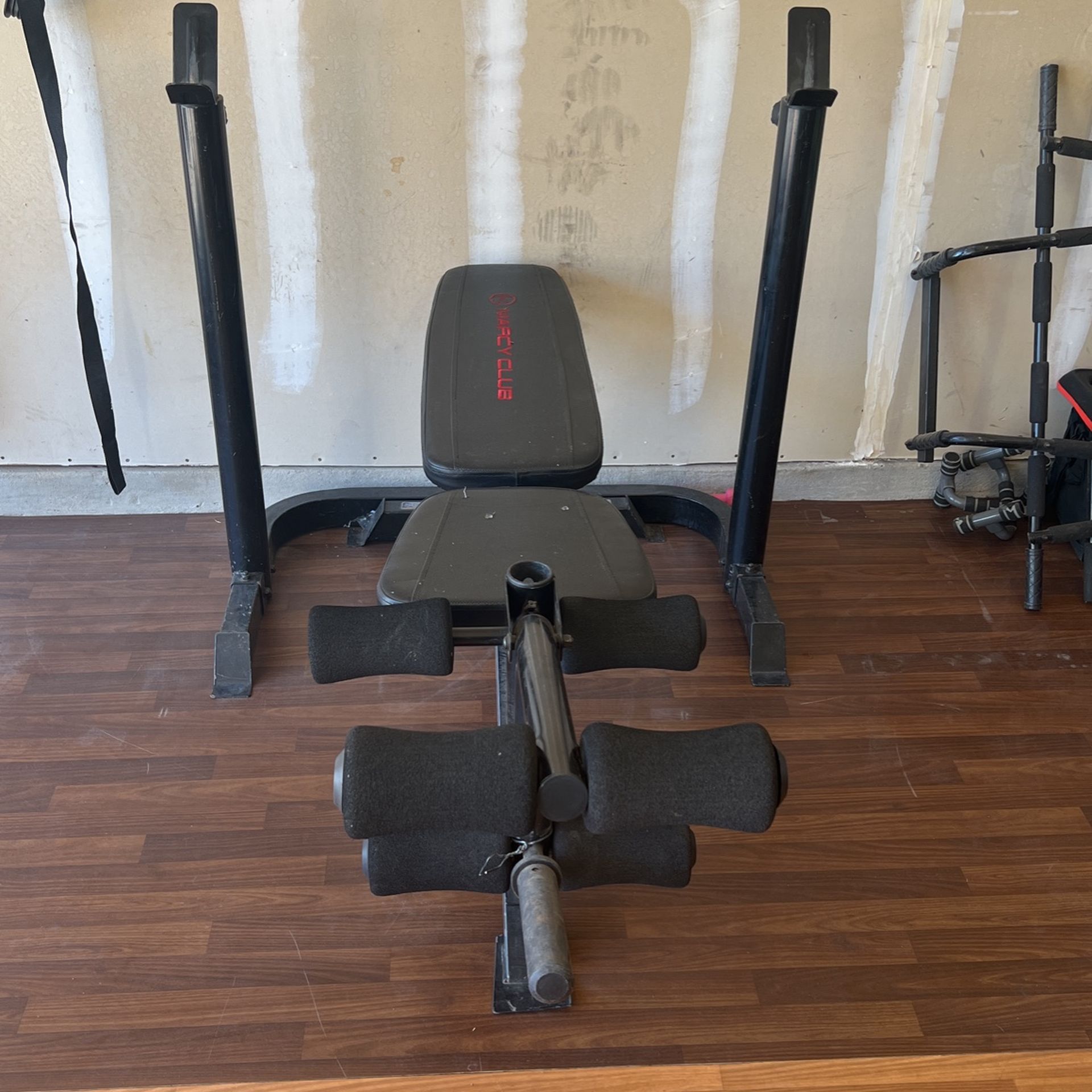 weight bench and squat rack