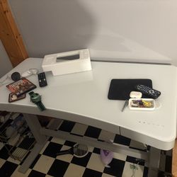 Raising/lowering Desk