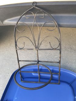 Iron hanging plant holder