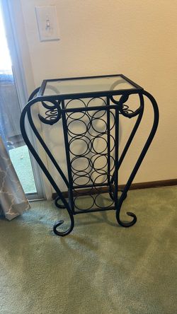 Wine rack with glass top