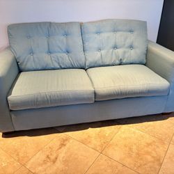 Apartment-Size Sofa Bed – Light Blue-Green, Good Condition