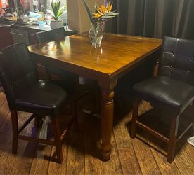 Counter height table and 9 chairs