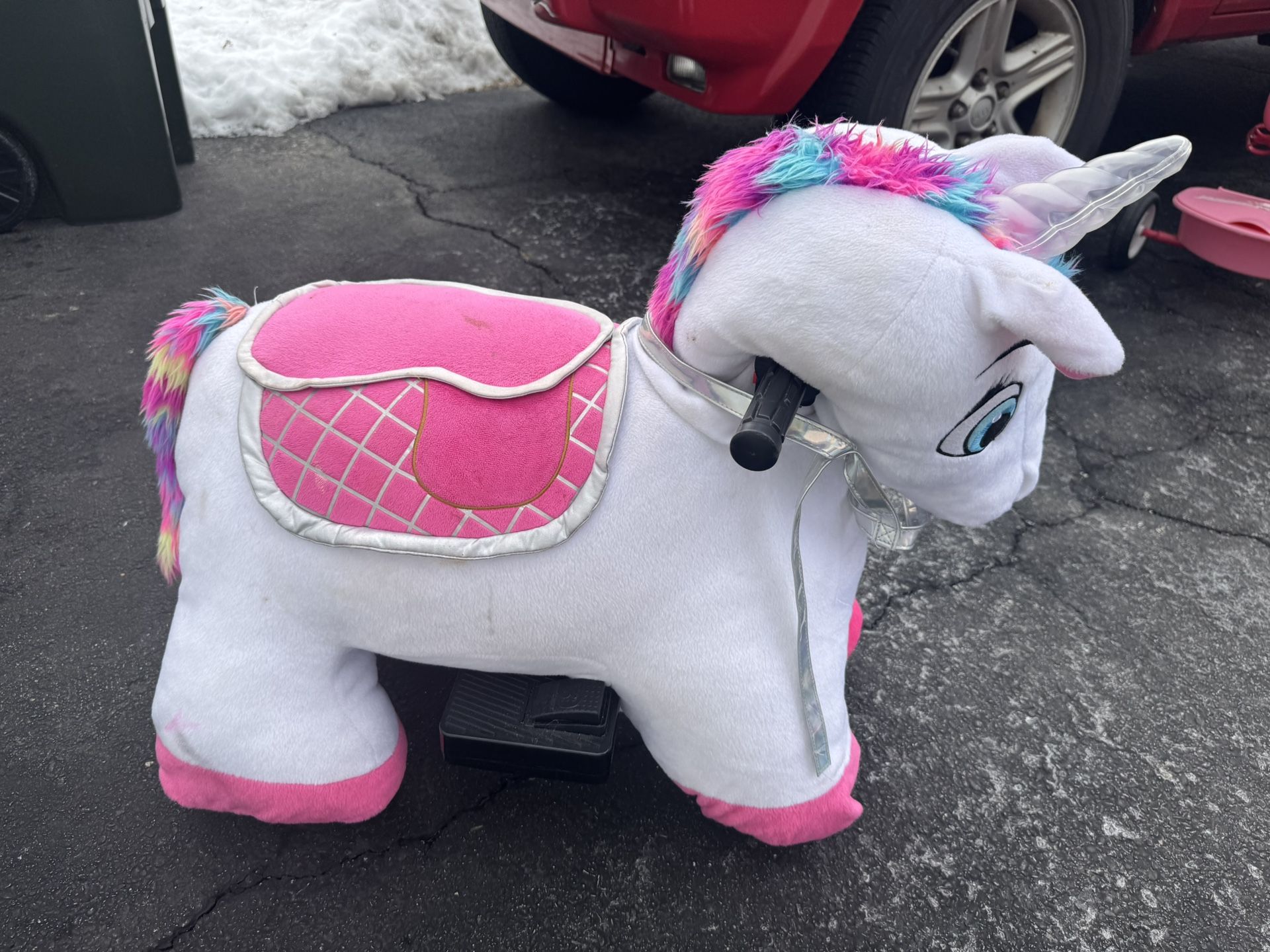 Ride-on plush unicorn
