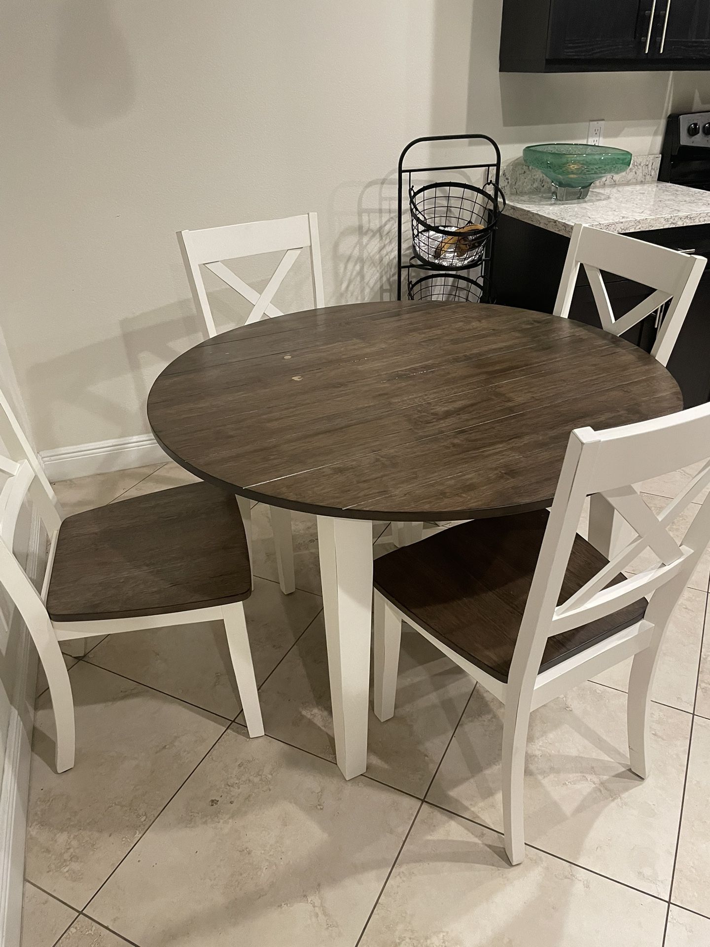 Brown Round Breakfast Table With 4 Chairs for $250