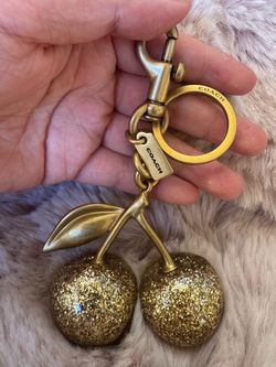 Coach cherry bag charm