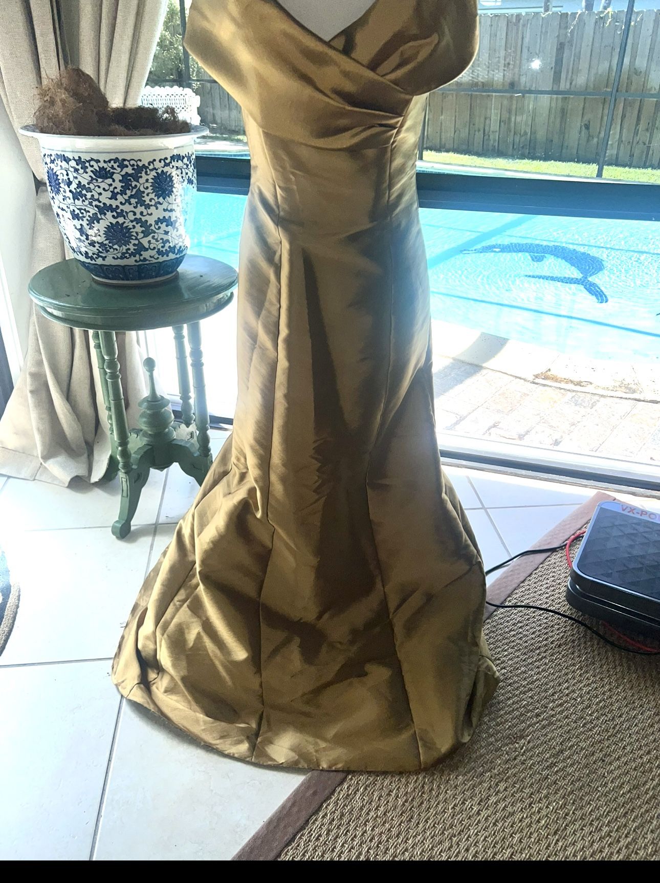 Brasilia long occasion dress with deep V-neckline and long flared skirt