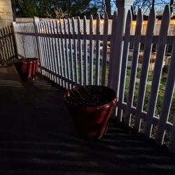 Two Large Red Plant Containers