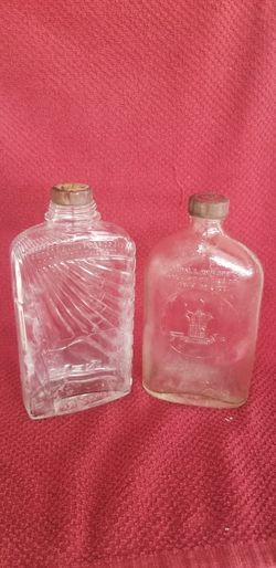 Set Of 2 Vintage Bottles With Original LIDS.