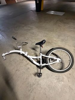 Kids tag-a-long bike attachment