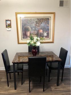 Like new dining table set with 4 leather chairs