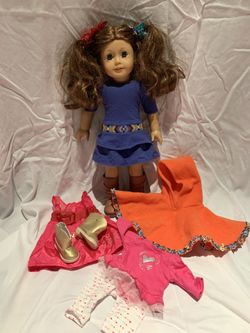 Saige American girl with collection of outfits