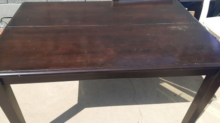 Table .. opens up,,,with leaflet in middle to open up bigger