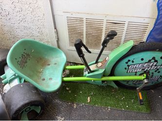 Green machine ride on bike