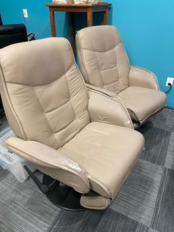 Pair of Beige Leather Swivel Recliner Chairs
