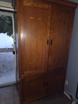 Light brown entertainment cabinet