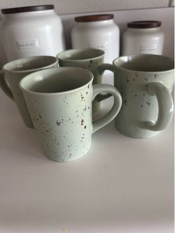 Green/ gold speckled coffee cups