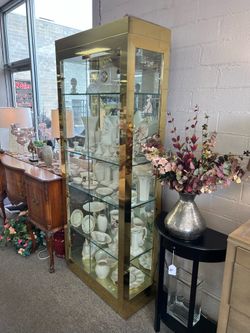 Vintage mid century Brass and glass cabinet   32 x 15 x 80.25 h 