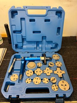 Pneumatic brake compressor caliper kit