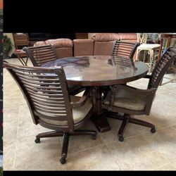 FREE KITCHEN TABLE AND 4 ROLLER CHAIRS VERY STURDY ‘NO GLASS TOPS ‘’