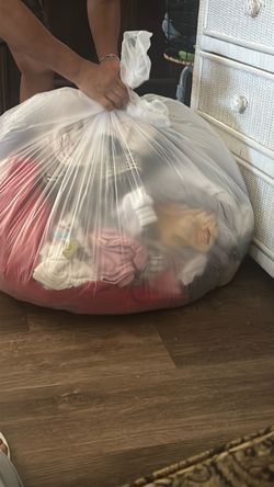 Bag full of clothes for a girl size small