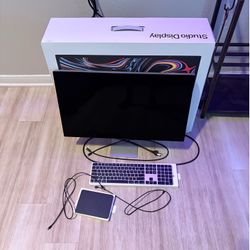 Apple Studio Display with magic touchpad and keyboard