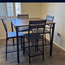 Dinning Set With It’s 4 Chairs Perfect Condition