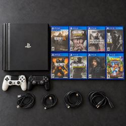 PS4 Pro Bundle – 2 Controllers + 8 Games – $250 OBO