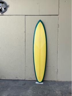 Guru Shapes mid size surfboard.