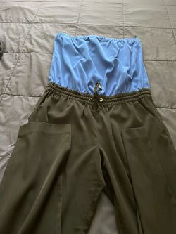 express Blue and Black Strapless Jumpsuit the size is Small it’s from express