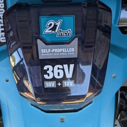 Battery self propelled lawn mower with charger and two batteries